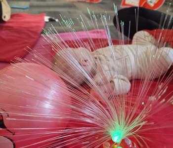 Baby on play mat with lights