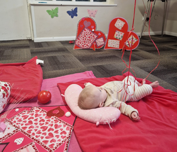 Baby on play mat