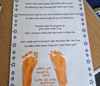 Poem signed with childs footprints