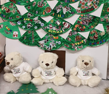 Group of babies dressed in christmas outfits