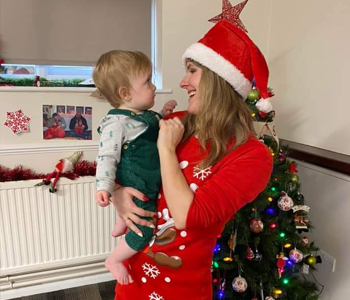 Two children in christmas dresses